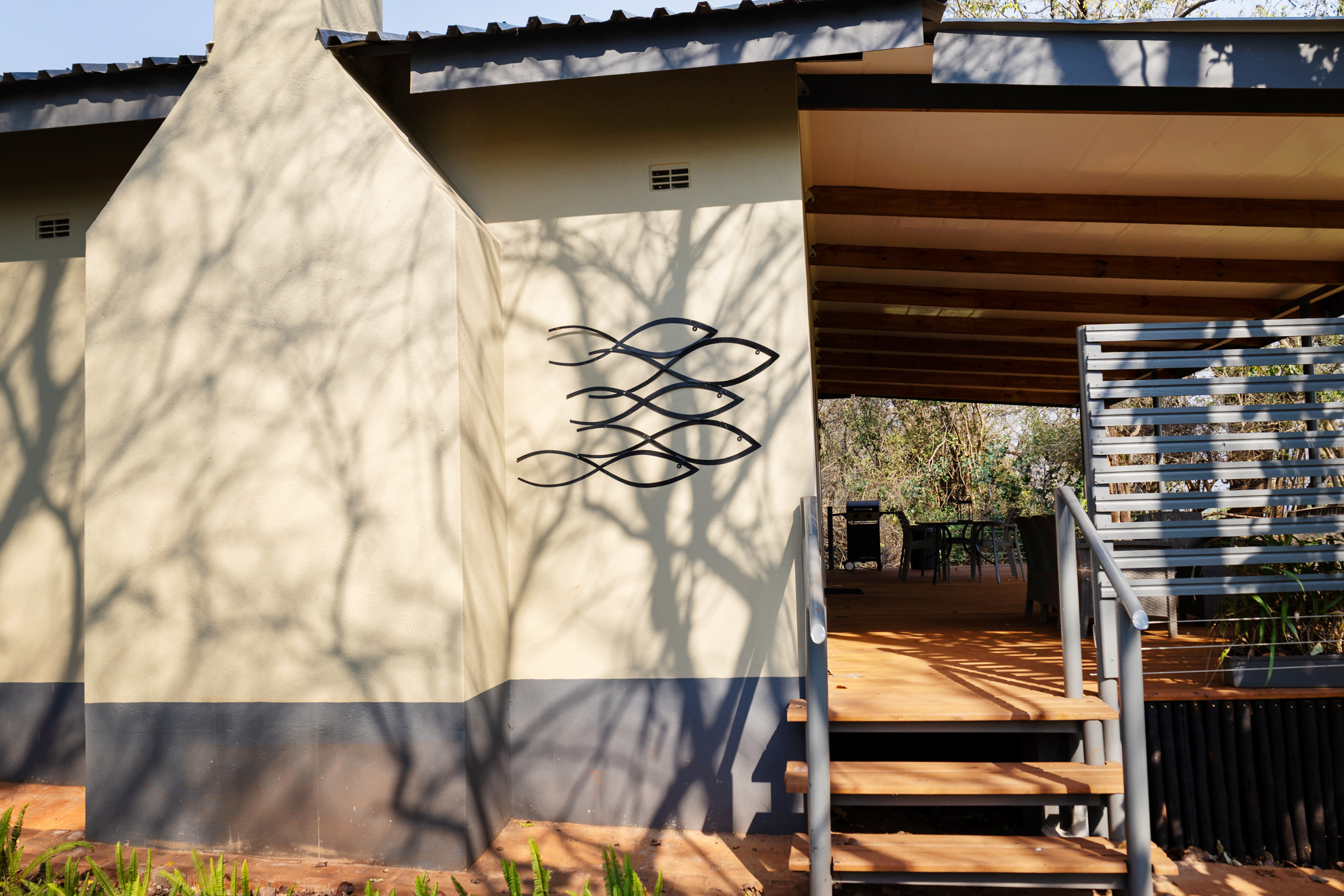 Entrance and deck steps at House 3