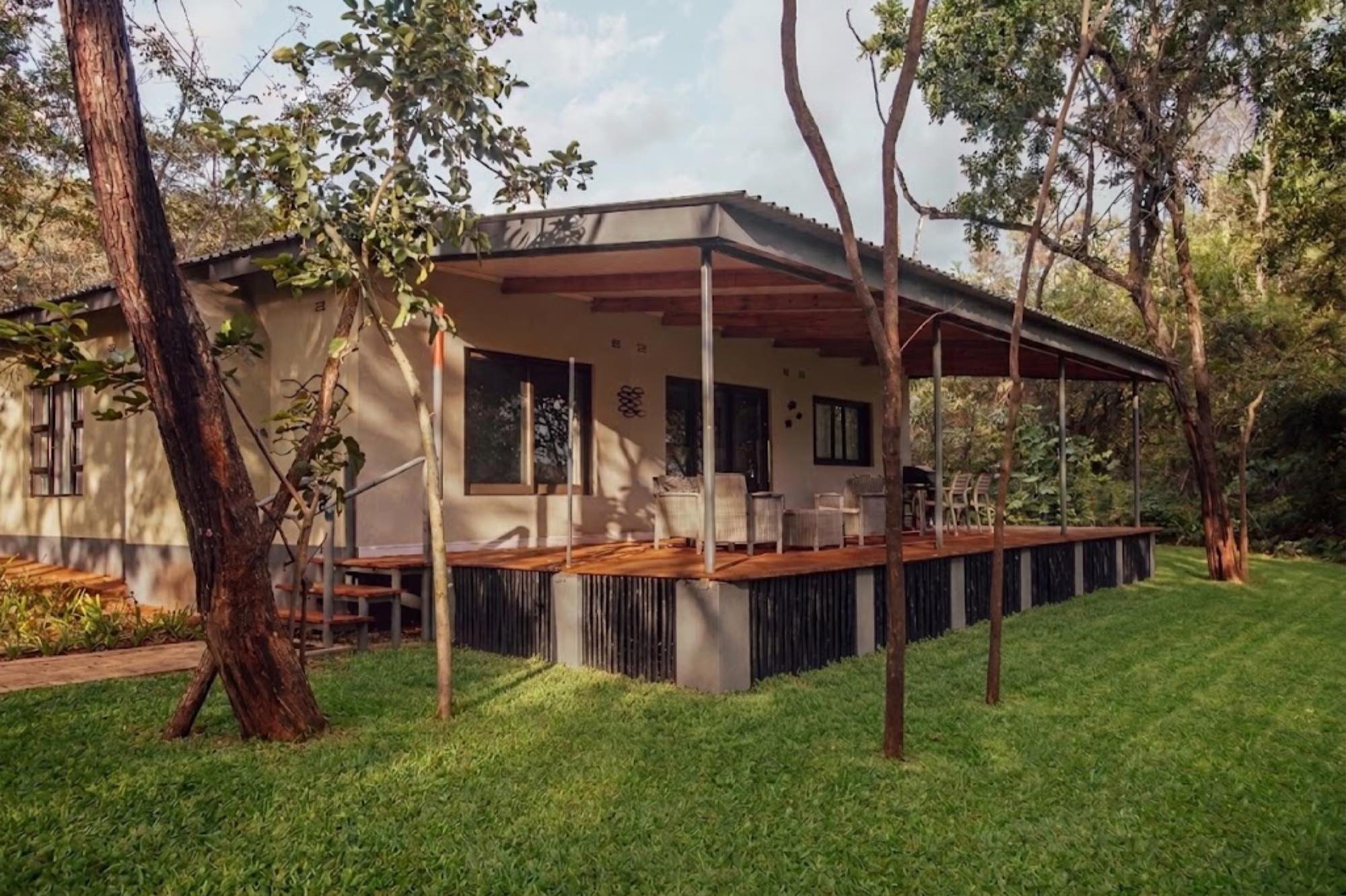 Standard Woodlands residence with covered deck