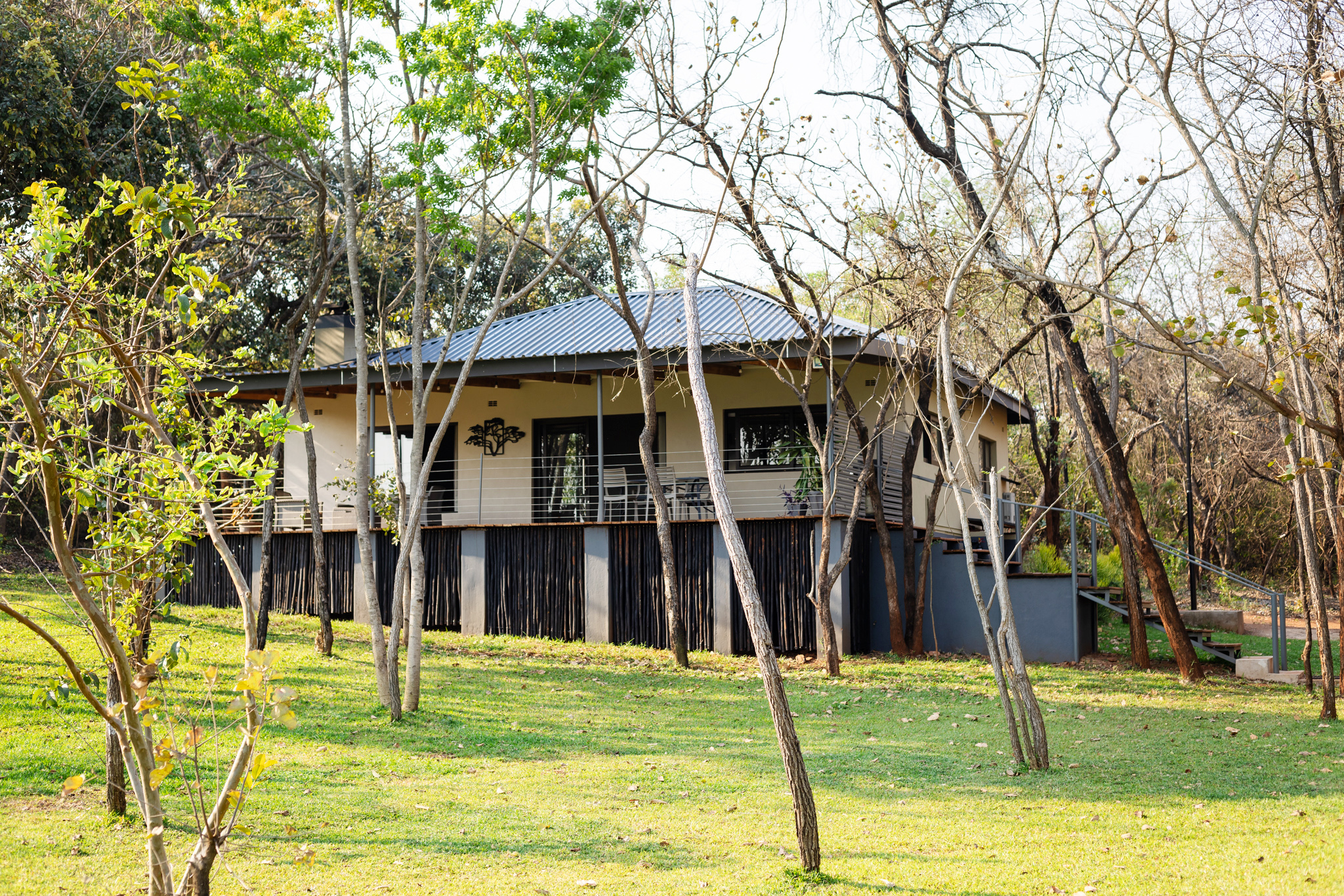 Exterior of House 1 at Woodlands with covered deck